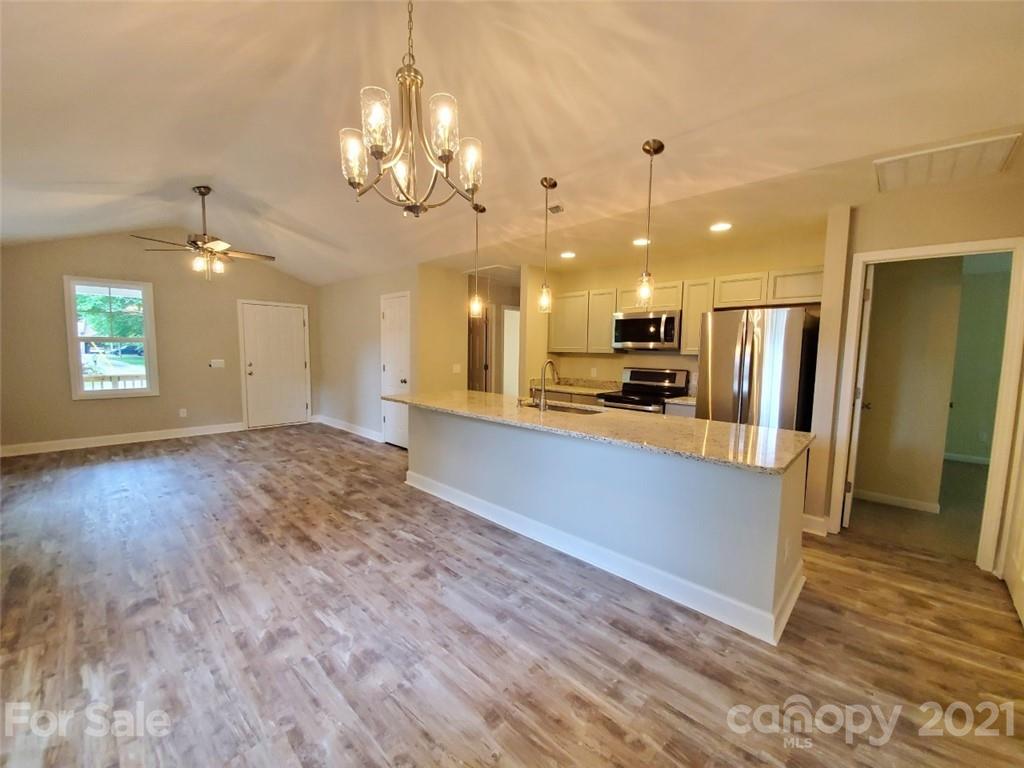430 Porter Road Rock Hill, SC 29730 - Photo 1 of 13 a view of a kitchen with a sink and a large mirror
