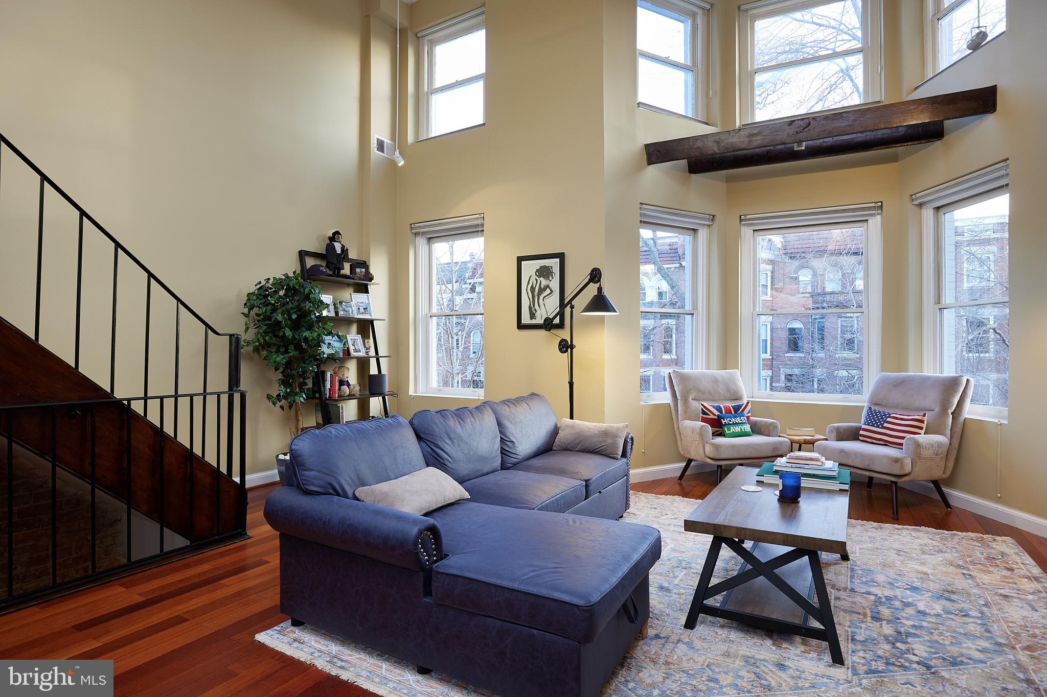 1745 T Street Northwest Washington, DC 20009 - Photo 16 of 35 a living room with furniture a rug and a window