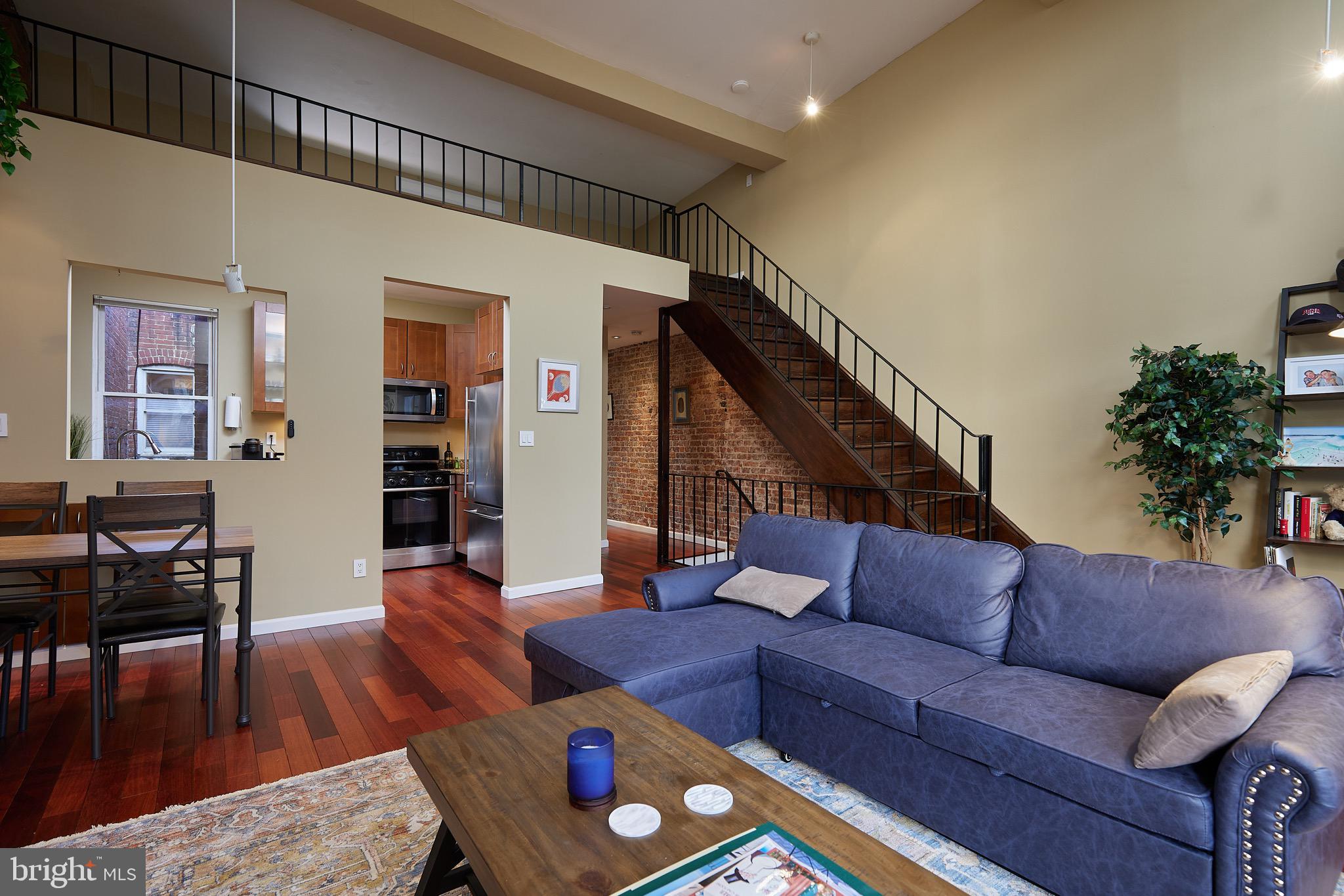 1745 T Street Northwest Washington, DC 20009 - Photo 18 of 35 a living room with furniture and a wooden floor