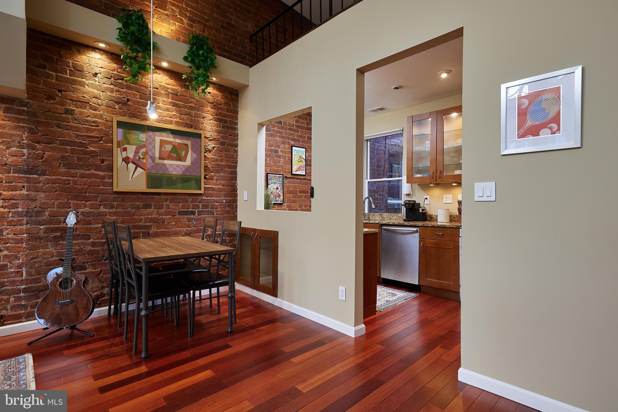 1745 T Street Northwest Washington, DC 20009 - Photo 19 of 35 a view of a dining room with furniture and wooden floor