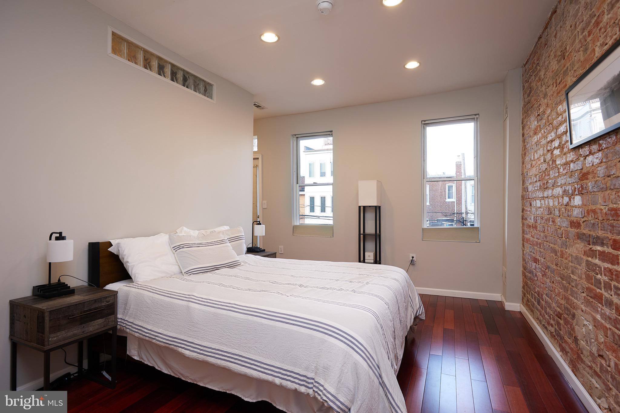 1745 T Street Northwest Washington, DC 20009 - Photo 22 of 35 a bedroom with a bed and a window