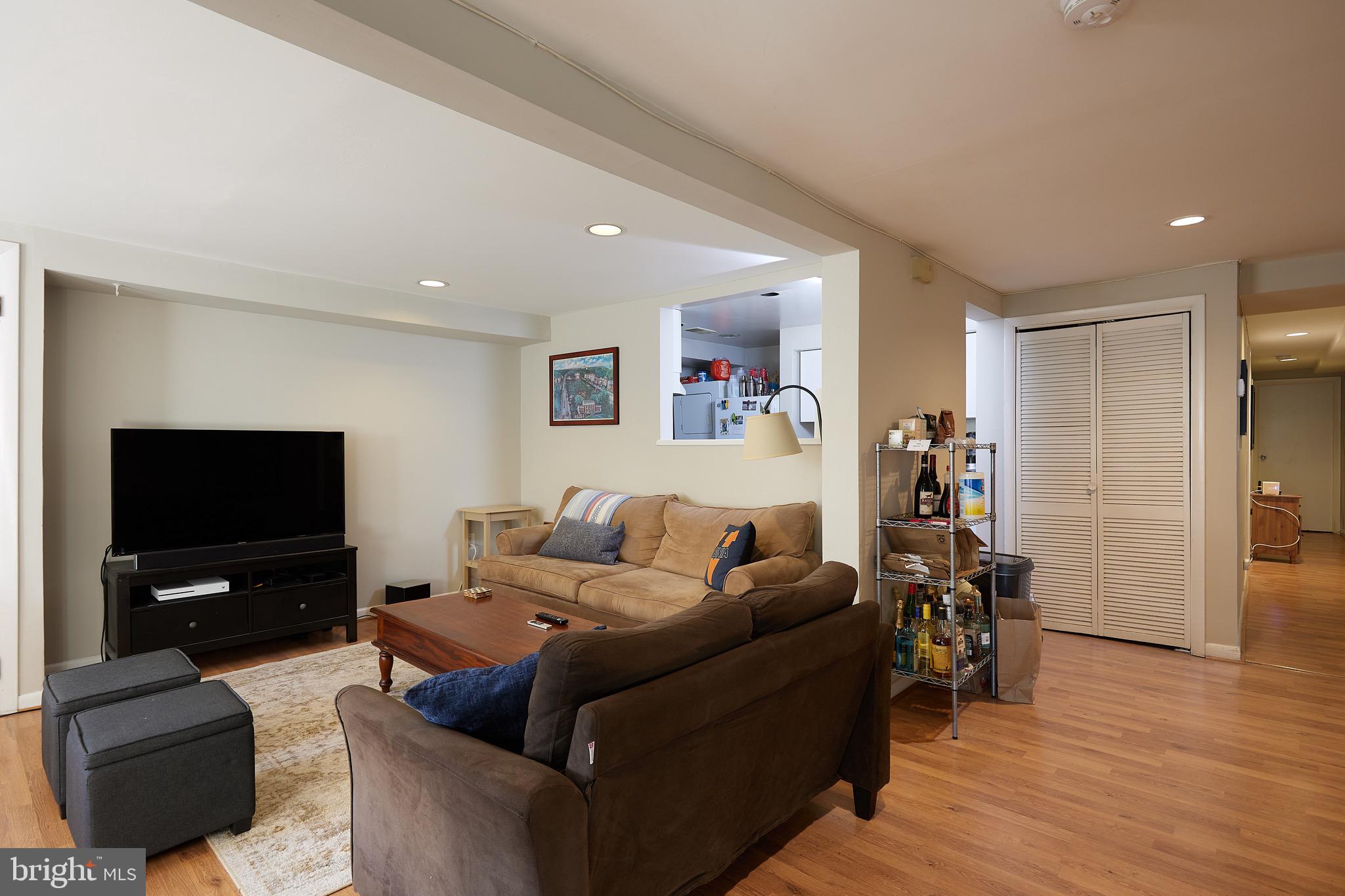 1745 T Street Northwest Washington, DC 20009 - Photo 28 of 35 a living room with furniture and a flat screen tv