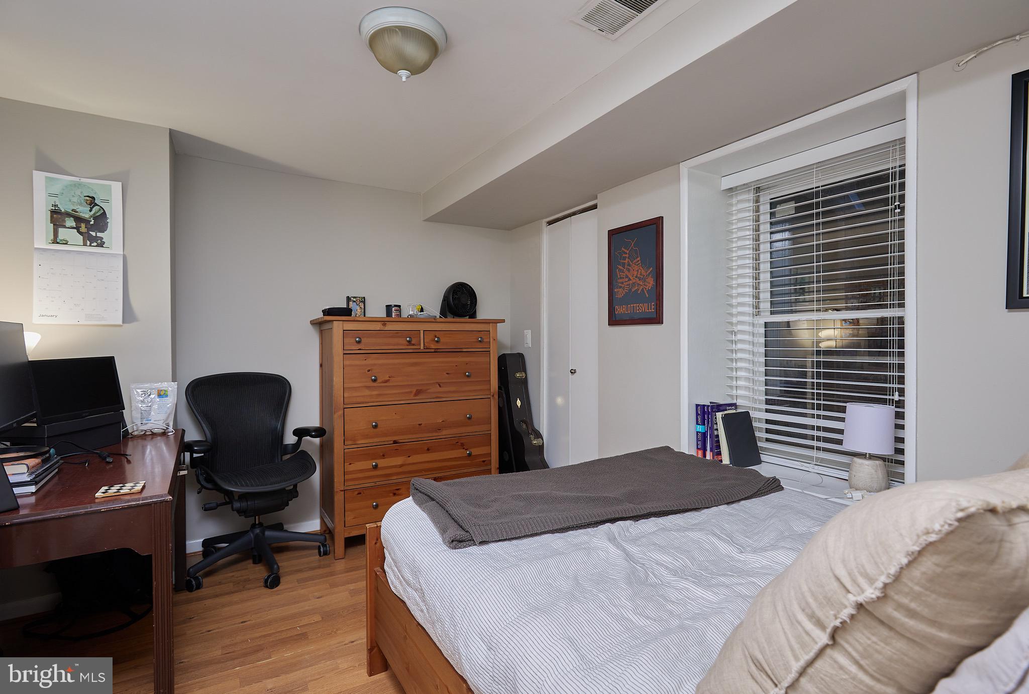1745 T Street Northwest Washington, DC 20009 - Photo 33 of 35 a bedroom that has a bed and a chair in it