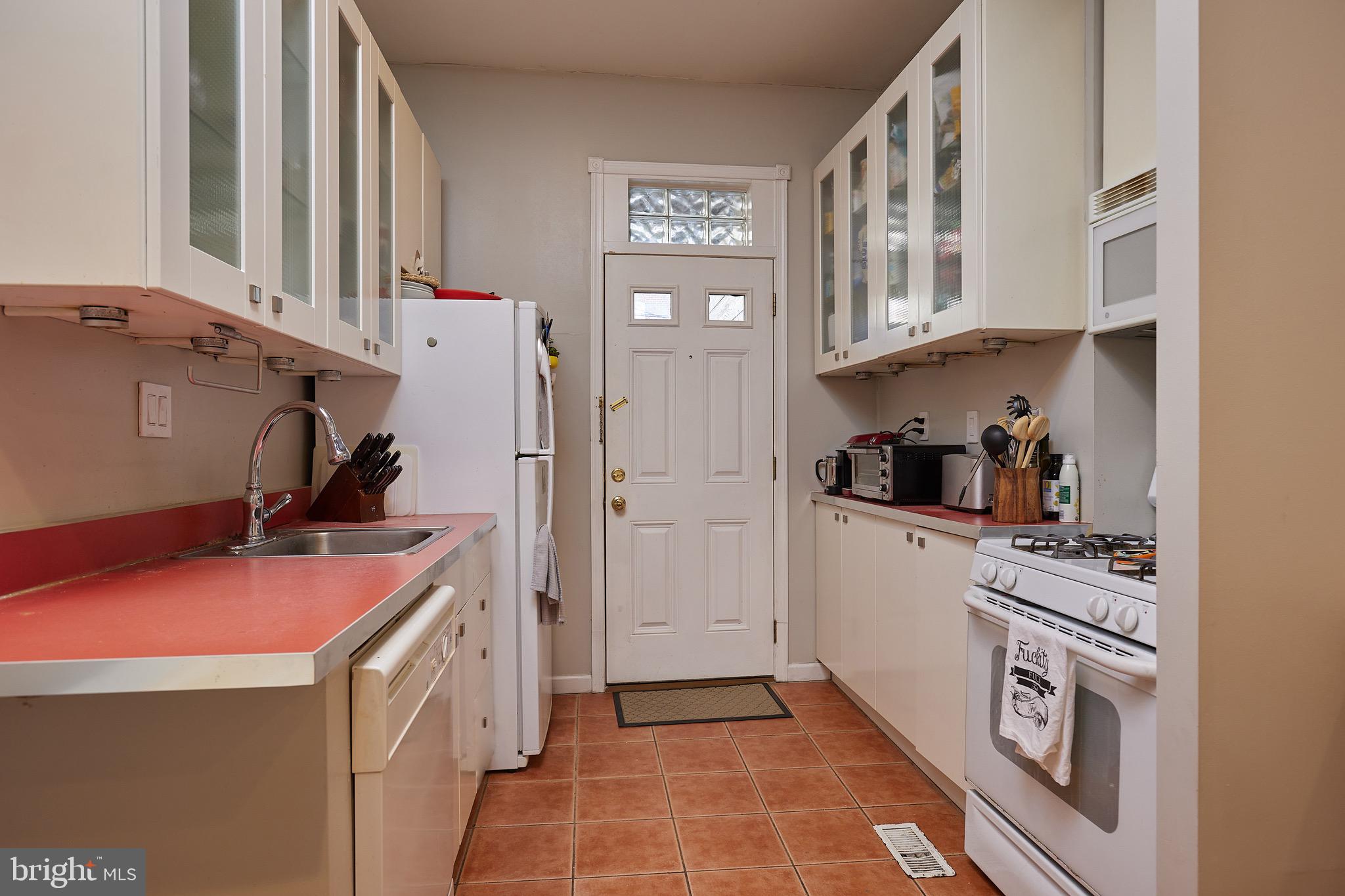 1745 T Street Northwest Washington, DC 20009 - Photo 7 of 35 a room with storage and utility