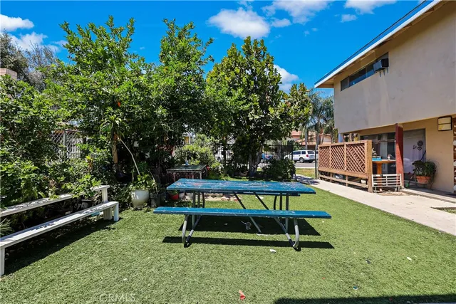 a garden with wooden fence