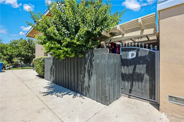 a street view with wooden fence
