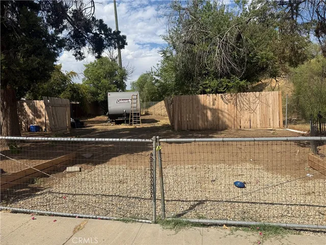 a view of balcony with wooden floor