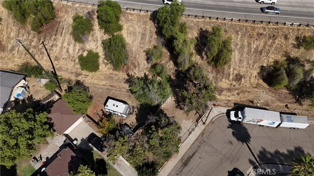 a view of a street with sitting area