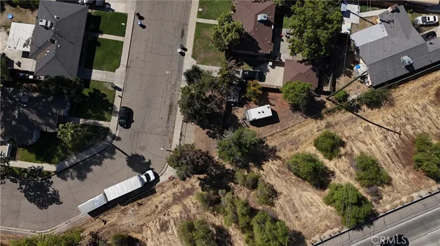 an aerial view of residential house with outdoor space