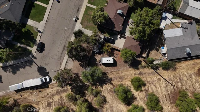 an aerial view of house with yard