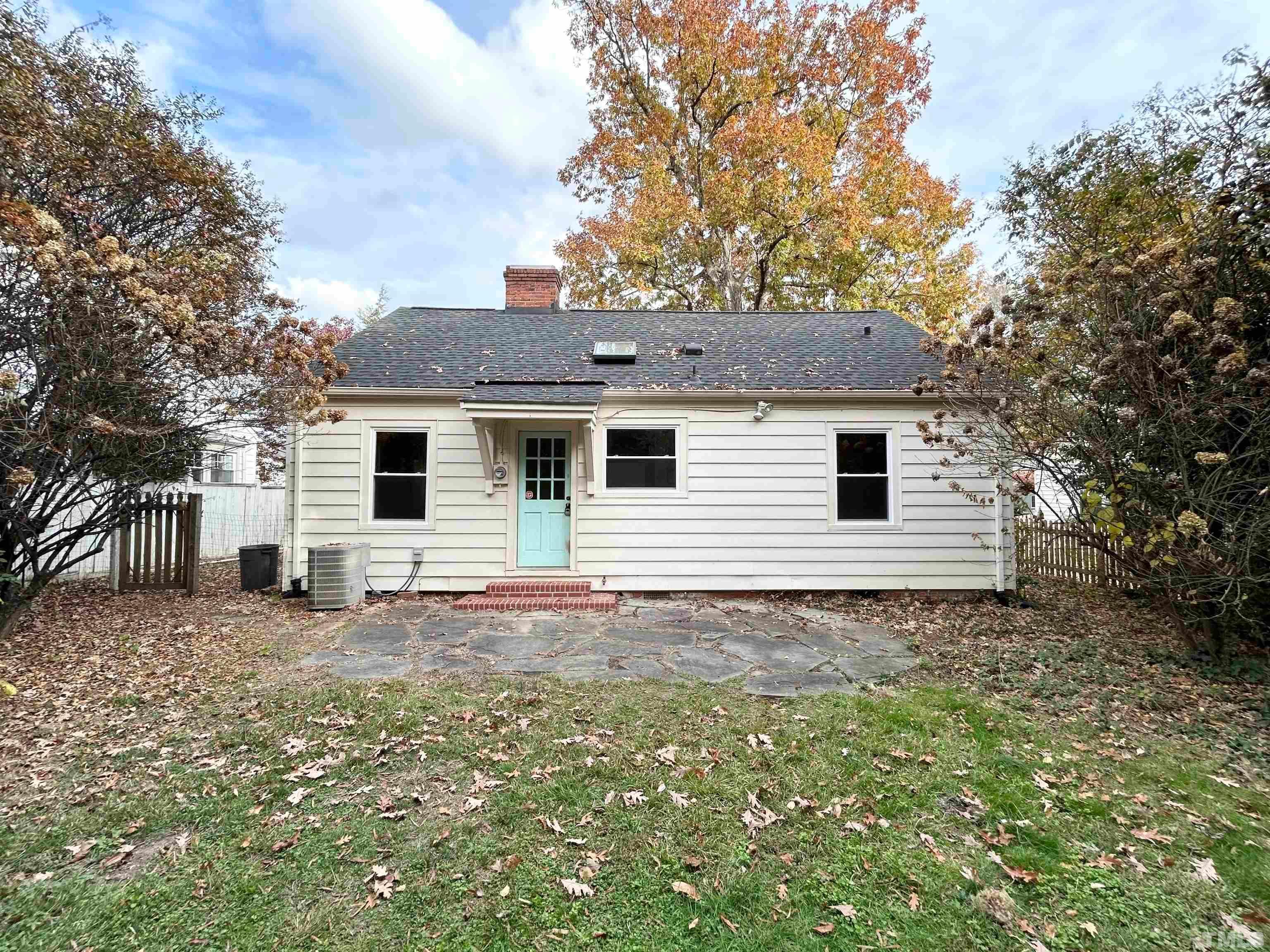 1607 Carson Street Raleigh, NC 27608 - Photo 15 of 17 a view of a house with a yard