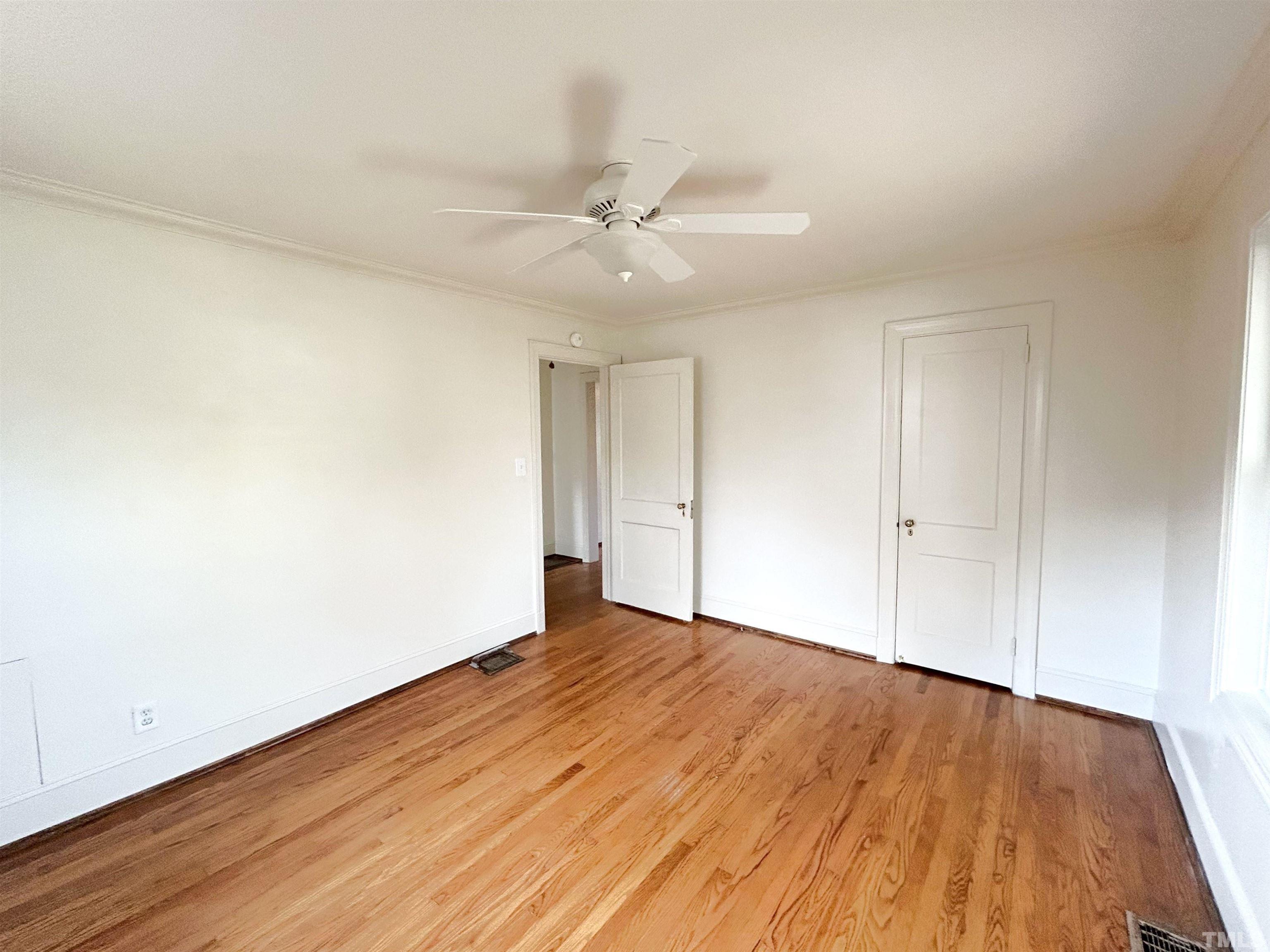 1607 Carson Street Raleigh, NC 27608 - Photo 9 of 17 wooden floor in an empty room