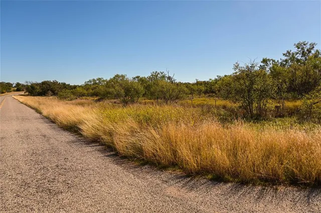 a view of lake with mountain in background