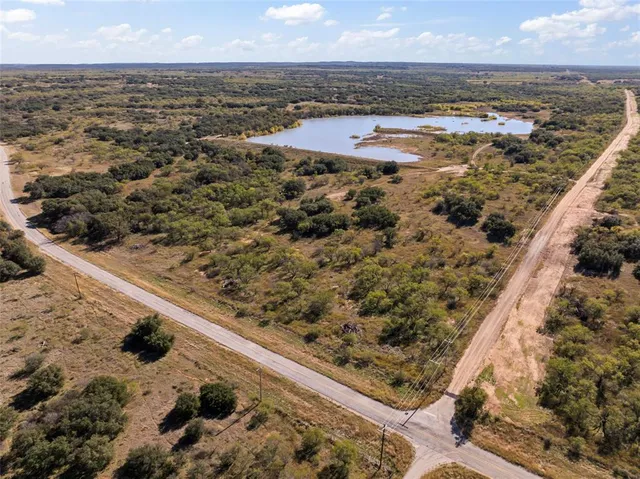 an aerial view of residential building and ocean