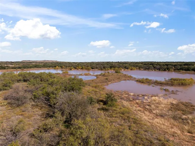 a view of an ocean and sunset
