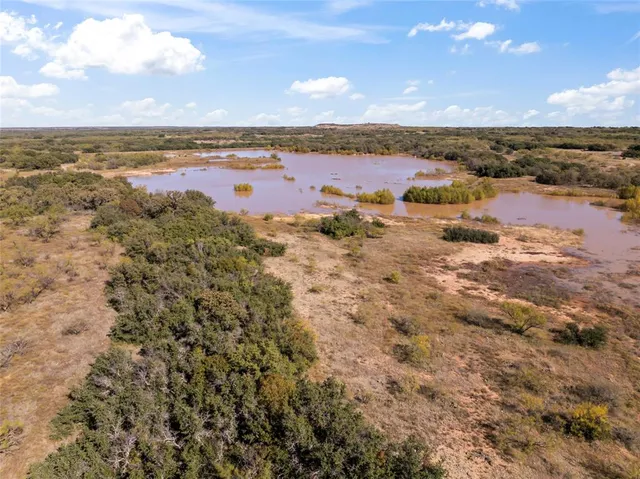 a view of a city with an ocean view