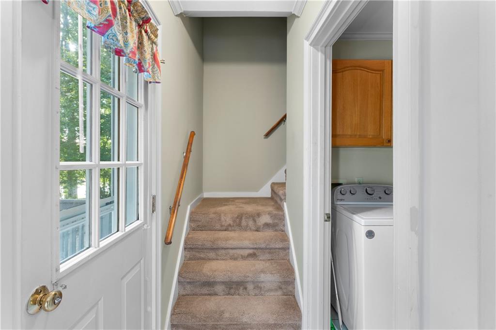24 Commerce Row Northeast Cartersville, GA 30121 - Photo 27 of 37 a view of a hallway with wooden floor and entryway