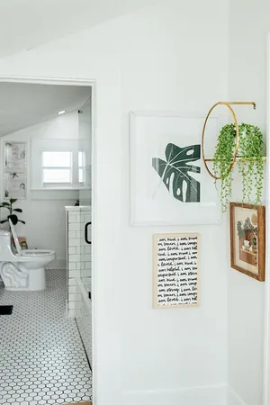 a bathroom with a toilet a sink and a window