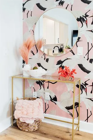 a living room with furniture and a rug