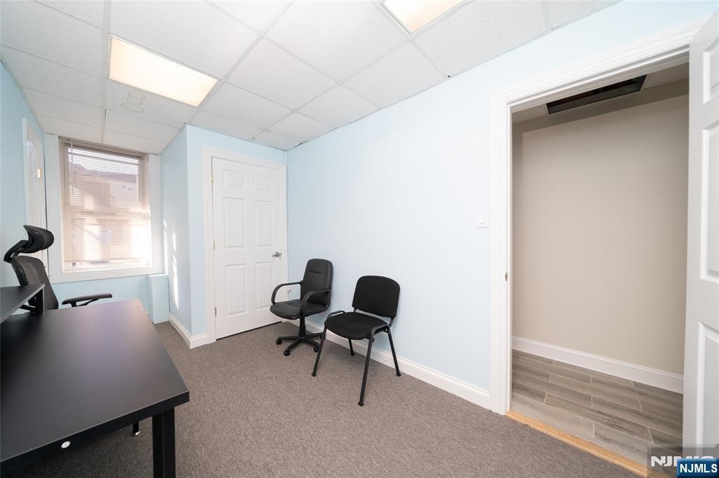26 Orange Road Montclair, NJ 07042 - Photo 13 of 45 a view of a workspace with furniture and a window