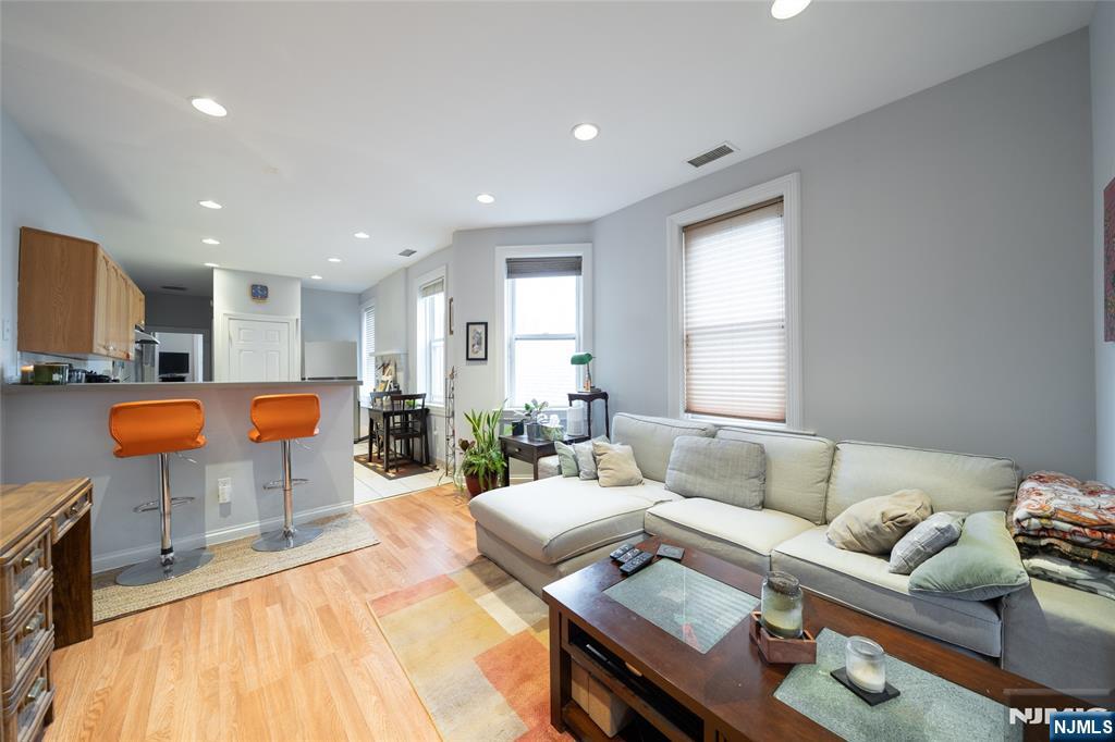 26 Orange Road Montclair, NJ 07042 - Photo 38 of 45 a living room with furniture and a table