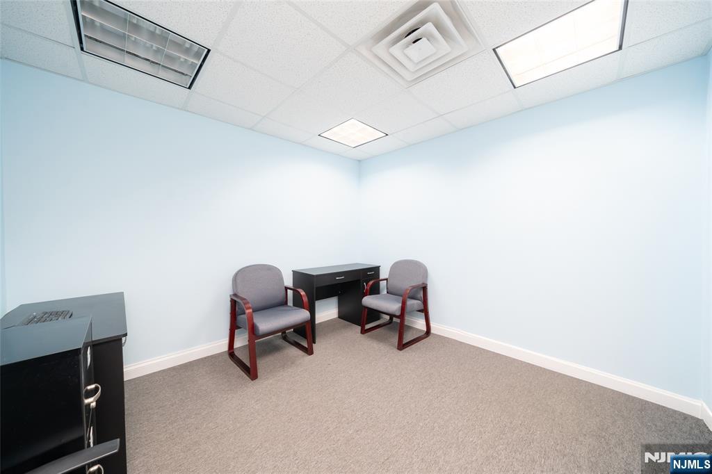 26 Orange Road Montclair, NJ 07042 - Photo 6 of 45 a view of workspace with lounge chair