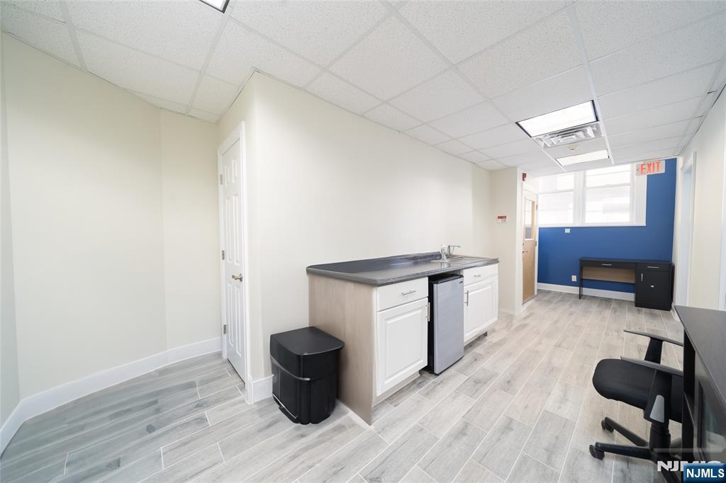 26 Orange Road Montclair, NJ 07042 - Photo 8 of 45 a view of workspace with wooden floor and furniture