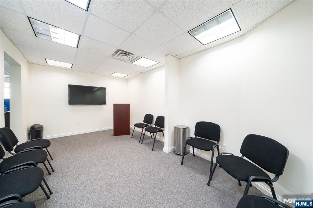 26 Orange Road Montclair, NJ 07042 - Photo 10 of 45 a livingroom with workspace and a couch