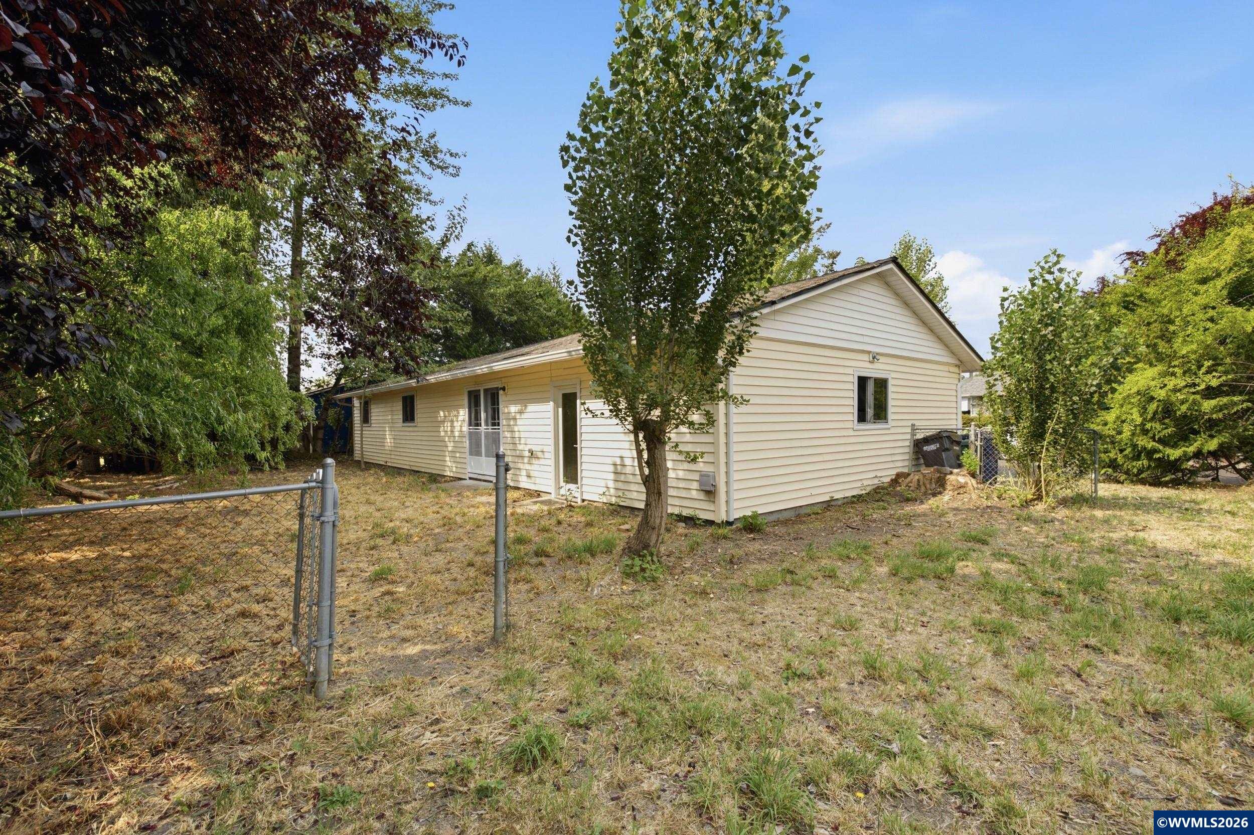 1213 Hemlock Loop Independence, OR 97351 - Photo 28 of 28 a view of a house with a yard