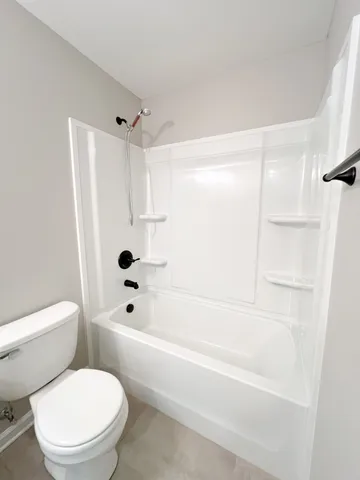 a view of a big room with carpet