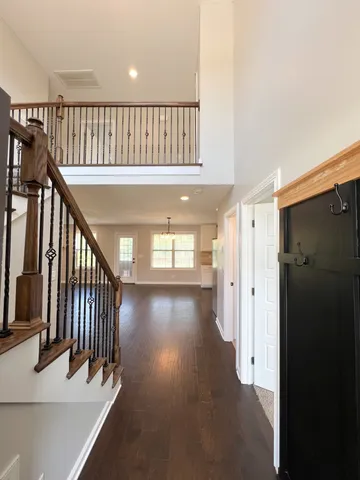 a bathroom with a shower and a sink