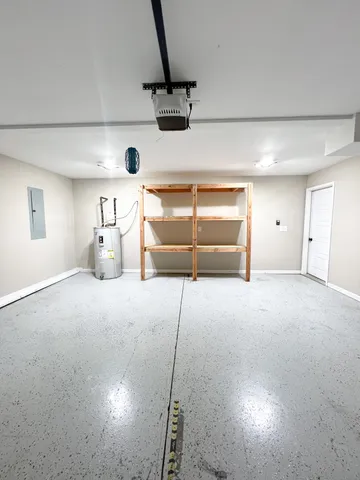 a view of a lake with houses in the background