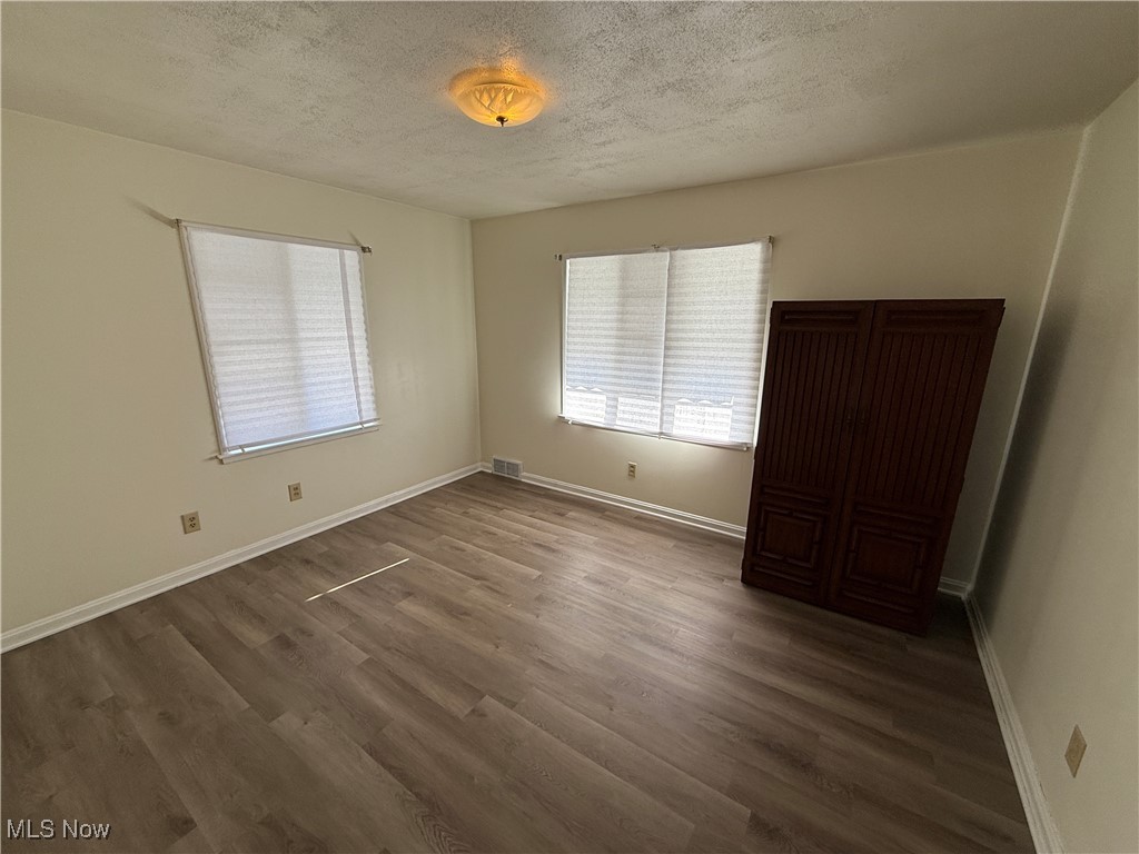 1209 Reed Avenue Akron, OH 44306 - Photo 5 of 20 Primary bedroom w/ vinyl plank flooring