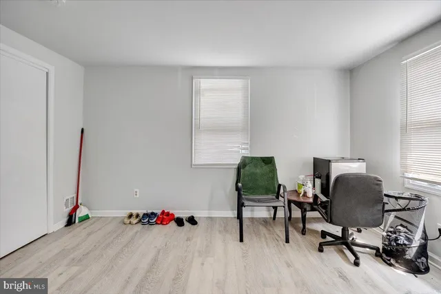 a workspace with furniture and a window