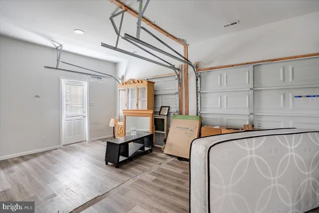 a bed room with a bed and furniture