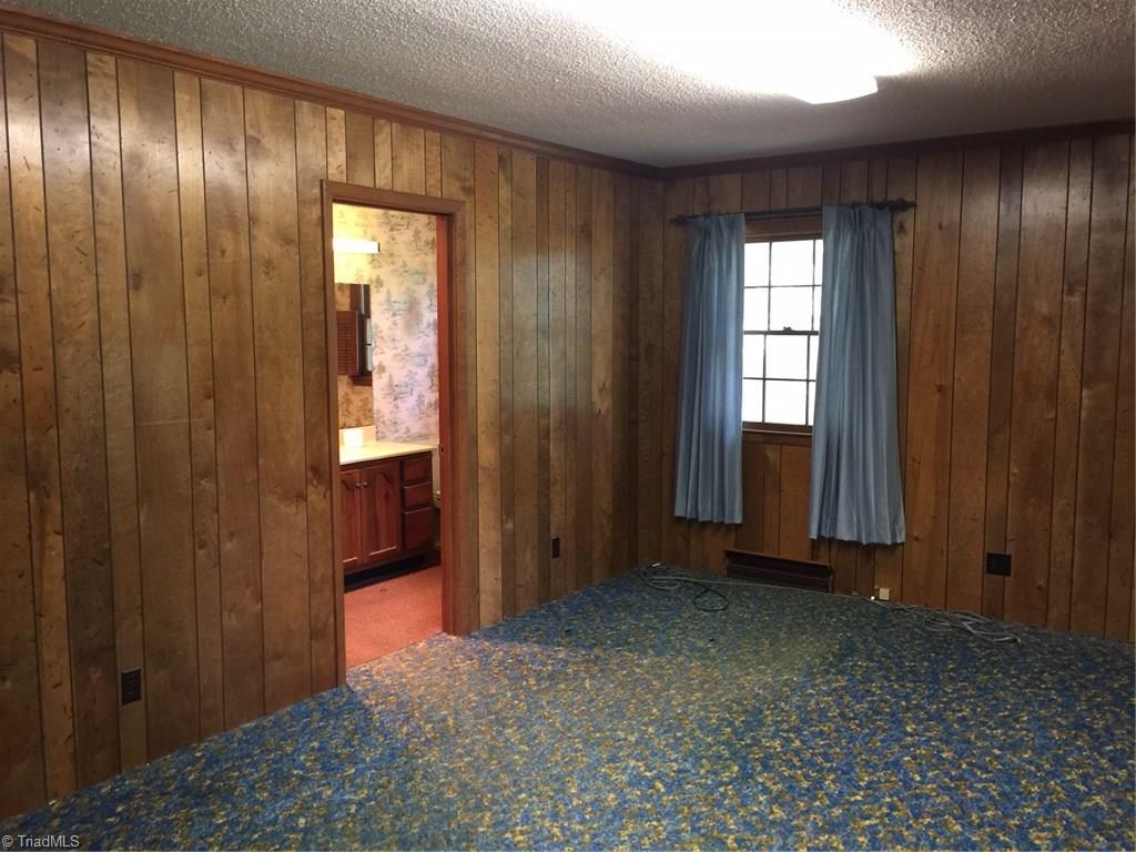1614 Jackson Lake Road High Point, NC 27263 - Photo 5 of 15 Master bedroom with full bath ensuite