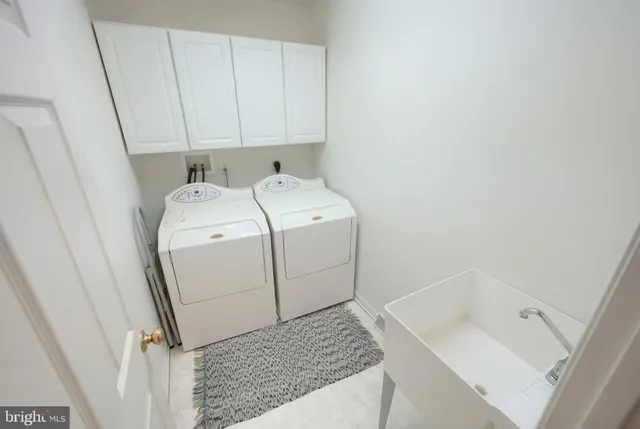 a living room with furniture and a area