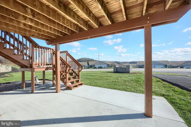 a view of a porch with a yard