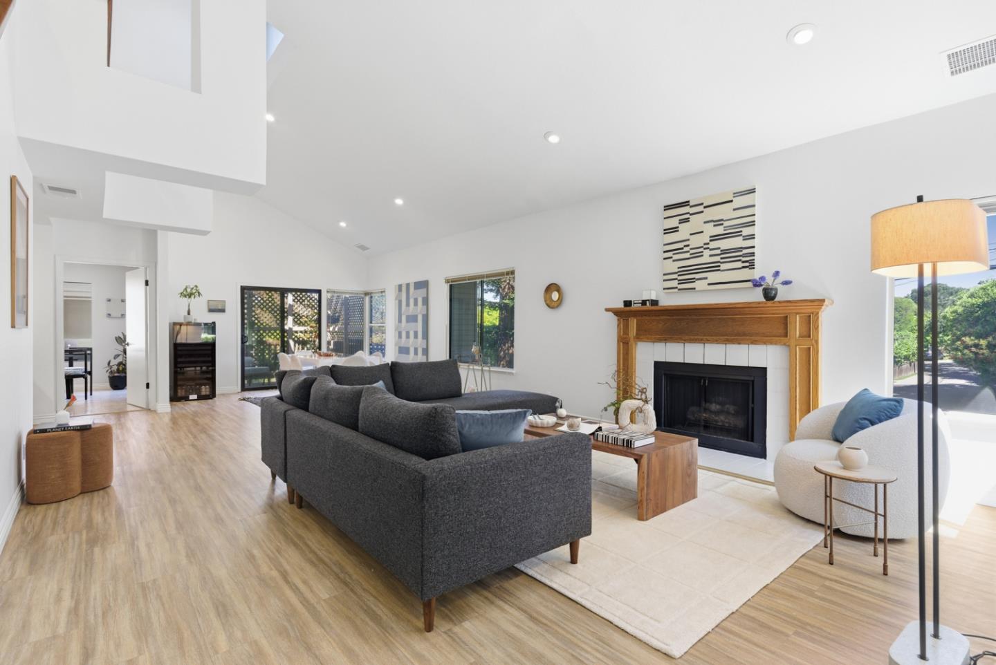 1669 Geary Road Walnut Creek, CA 94597 - Photo 4 of 39 a living room with furniture and a fireplace