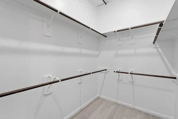 a view of an empty walk in closet