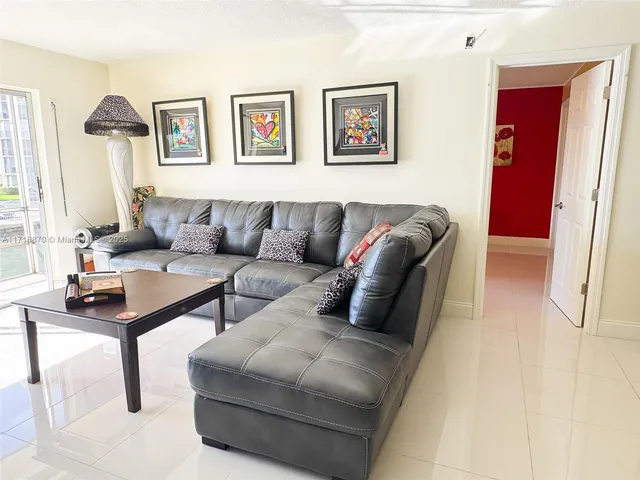 a view of balcony and yard