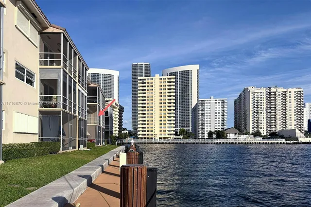 a front view of building with yard