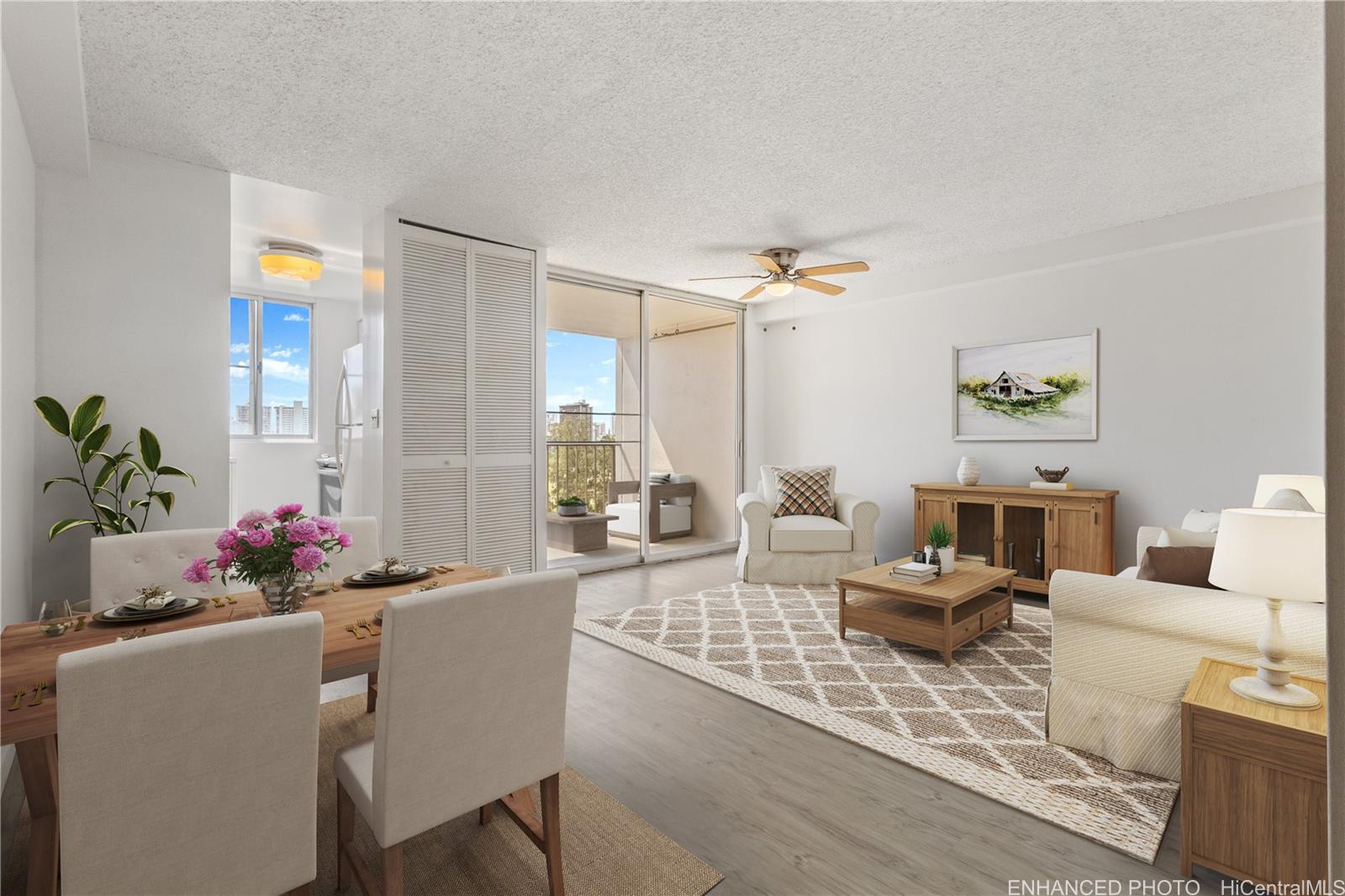2916 Date Street, Unit 6G Honolulu, HI 96816 - Photo 1 of 20 a living room with furniture and flowers