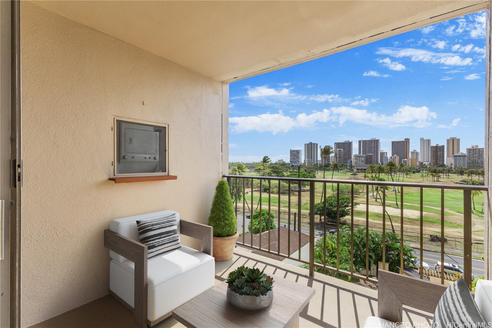 2916 Date Street, Unit 6G Honolulu, HI 96816 - Photo 3 of 20 a view of a balcony with lake view and a potted plant