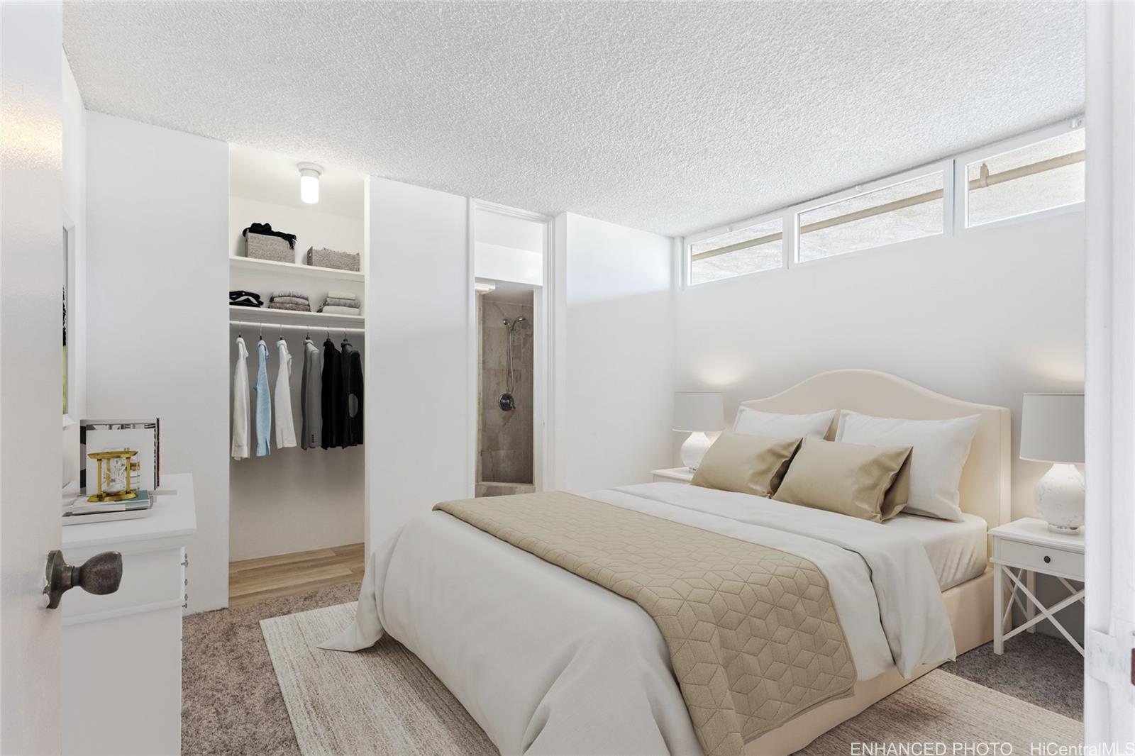 2916 Date Street, Unit 6G Honolulu, HI 96816 - Photo 7 of 20 a bedroom with a bed and a refrigerator