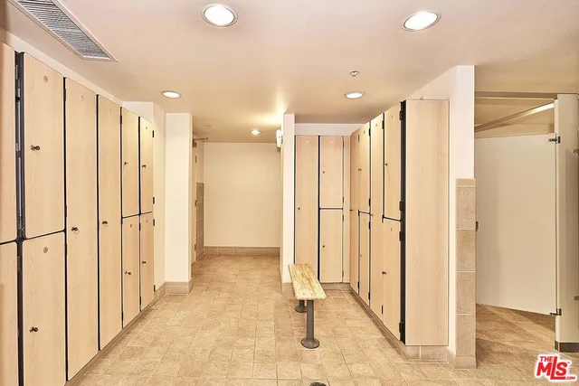a view of a hallway with shower