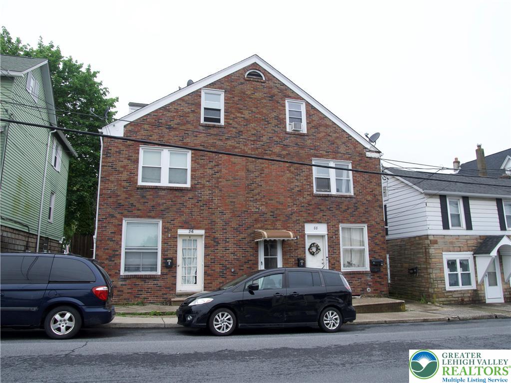 86 Garibaldi Avenue Roseto, PA 18013 - Photo 1 of 30 a car parked in front of a house