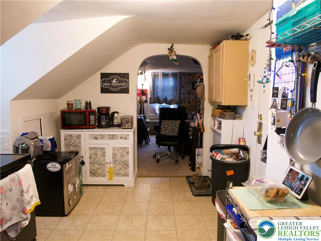 86 Garibaldi Avenue Roseto, PA 18013 - Photo 23 of 30 a kitchen with a sink and cabinets