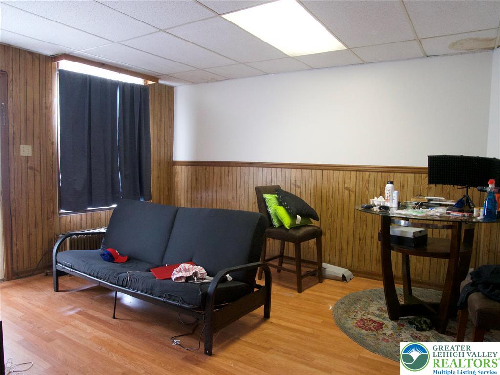 86 Garibaldi Avenue Roseto, PA 18013 - Photo 27 of 30 a living room with furniture and wooden floor