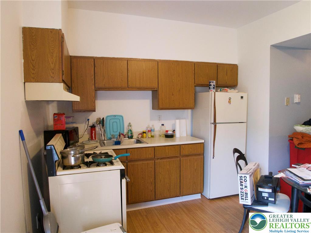 86 Garibaldi Avenue Roseto, PA 18013 - Photo 3 of 30 a kitchen with stainless steel appliances granite countertop a sink stove and refrigerator